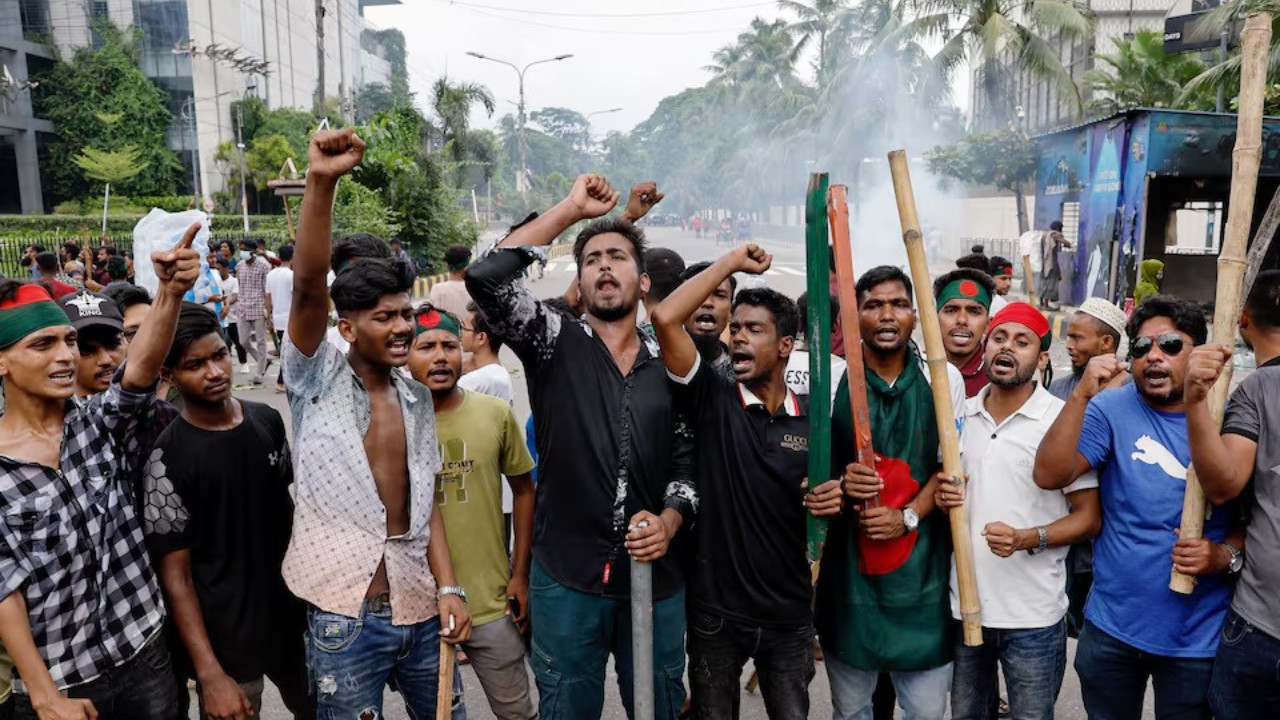  Bangladesh Awami League workers angered by news of Sheikh Hasinas return beat up policemen 